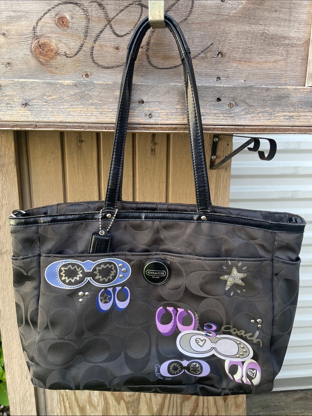 Coach Black Signature Canvas Tote with Purple and Blue Graphic Accents